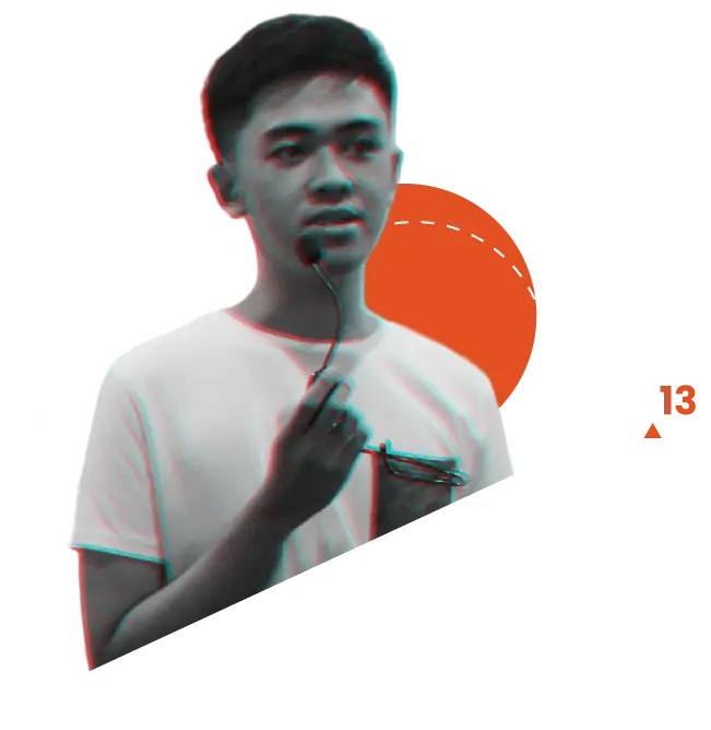 Lance Endaya holding a microphone